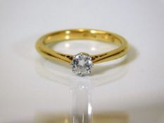 An 18ct gold solitaire ring set with 0.25ct of diamond 2.7g with Bakelite box