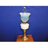 A Victorian oil lamp with 19thC. vaseline glass sh