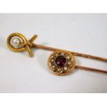 Two antique tie pins one set with pearl & the othe