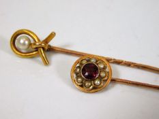 Two antique tie pins one set with pearl & the othe