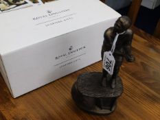 A boxed Doulton Sporting figure