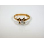 A 9ct gold ring set with a 0.25ct diamond 1.7g