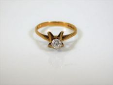 A 9ct gold ring set with a 0.25ct diamond 1.7g