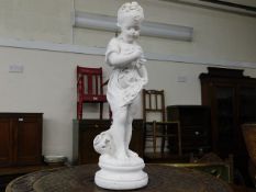 A decorative figure of a young child