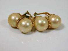 A pair of Mallorcan pearl earrings in yellow metal