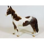 A Beswick Skewbald pony 6.5in high