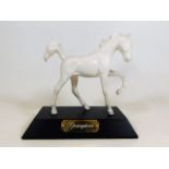 A Royal Doulton porcelain horse mounted