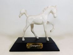 A Royal Doulton porcelain horse mounted