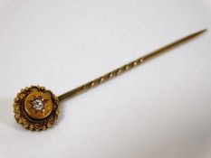A 15ct gold tie pin set with small diamond 1.4g