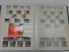 A large album of mint stamps mirrored by used ones