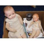 Three vintage childs dolls