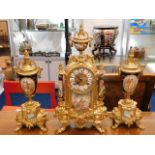 A Sevres style brass garniture clock set