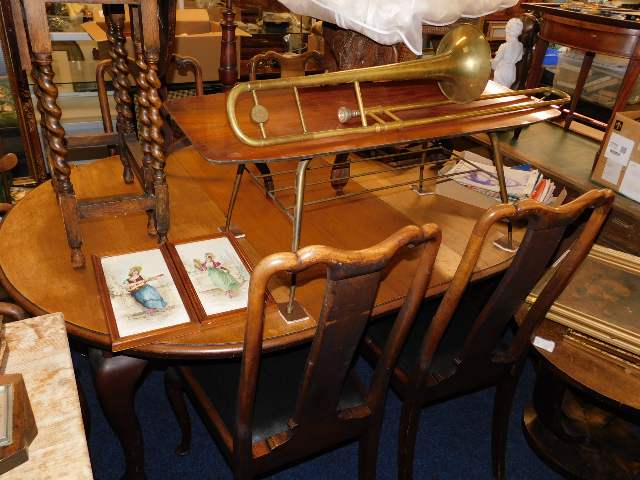 A mahogany table with one carver & four chairs