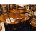 A mahogany table with one carver & four chairs