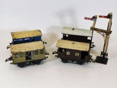 Four early 20thC. tinplate carriages & a railway s