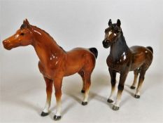 Two Beswick horses, both with chip to ears