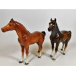 Two Beswick horses, both with chip to ears