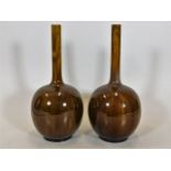 A pair of Burmantofts art pottery vases 9.5in high