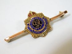 A 9ct gold enamelled sweetheart brooch Royal Army