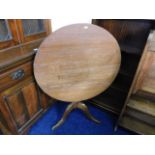 A 19thC. tilt top table