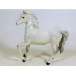 A Beswick dapple grey horse 6.625in high