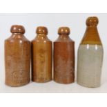 Four stoneware bottles including W. Dubbin, Devonp