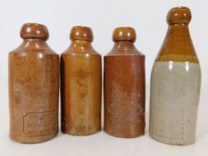 Four stoneware bottles including W. Dubbin, Devonp