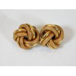 Two 14ct gold knot earrings approx. 10.9g