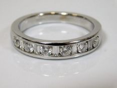 A large 18ct white gold ring set with six diamonds