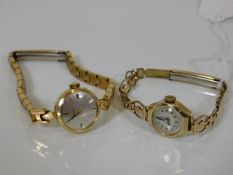 A 9ct gold cased ladies watch twinned with a yello