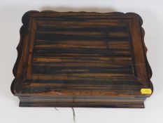 A 19thC. coromandel wood writing slope