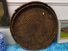 Two early 20thC. eastern woven coil trays