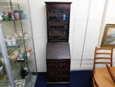 An antique slimline mahogany bureau bookcase set w