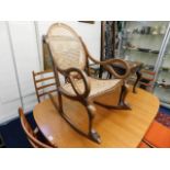 An early 19thC. bentwood rocking chair, a/f old repair to rear