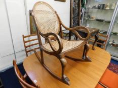 An early 19thC. bentwood rocking chair, a/f old repair to rear