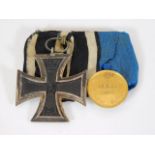 A German WW1 two place medal group including iron