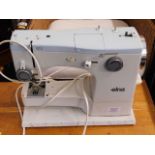 An Elna electric sewing machine