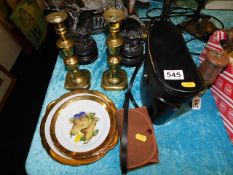 A pair of binoculars, a set of decorative plates & a camera