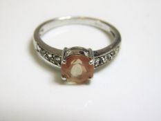 A 9ct gold white gold ring set with pink quartz &