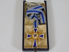 A German WW2 Third Reich Nazi gold mothers cross w