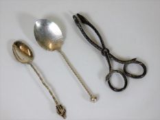 Two silver spoons twinned with a pair of 19thC. wh