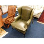 A 19thC. style leather wingback armchair