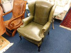 A 19thC. style leather wingback armchair