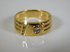 A 14ct gold buckle ring set with diamond 4.5g
