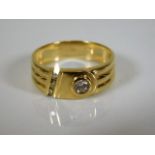 A 14ct gold buckle ring set with diamond 4.5g