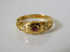 A Victorian 18ct gold ring set with ruby & diamond