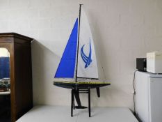 A large remote control racing yacht Phantom 72in h