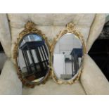 Two decorative bevelled edge wall mirrors