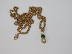 A 9ct gold necklace with pendant set with diamond,