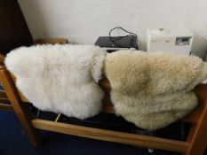 Two sheep skin rugs